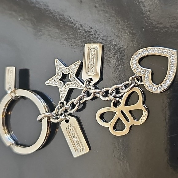 Coach NWOT Silver Keychain with Heart, Star, and Butterfly Charms - Picture 1 of 7
